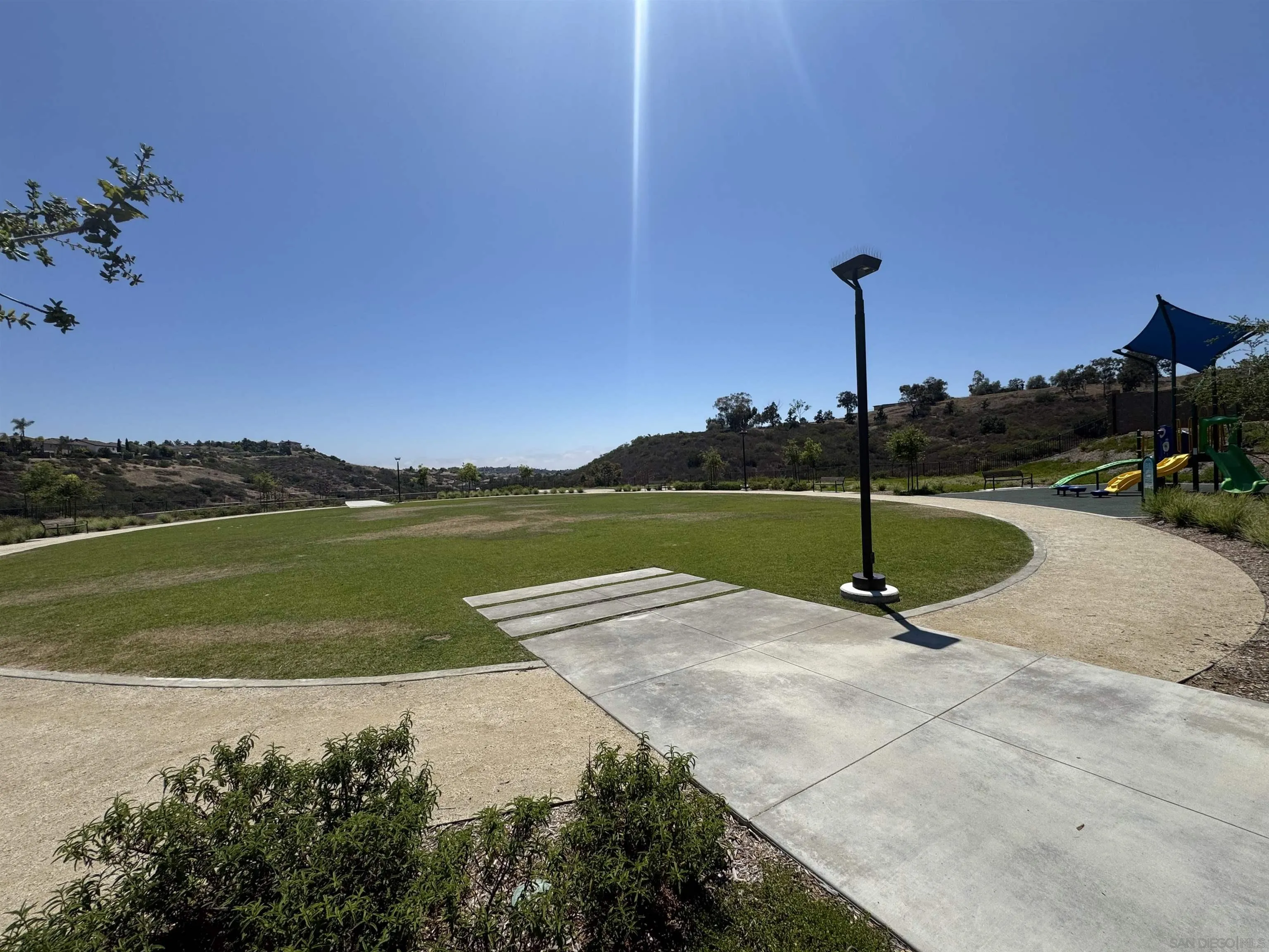 941 Lindbergh Drive San Marcos, CA 92069 - Photo 40 of 44 a view of a lake with a palm tree