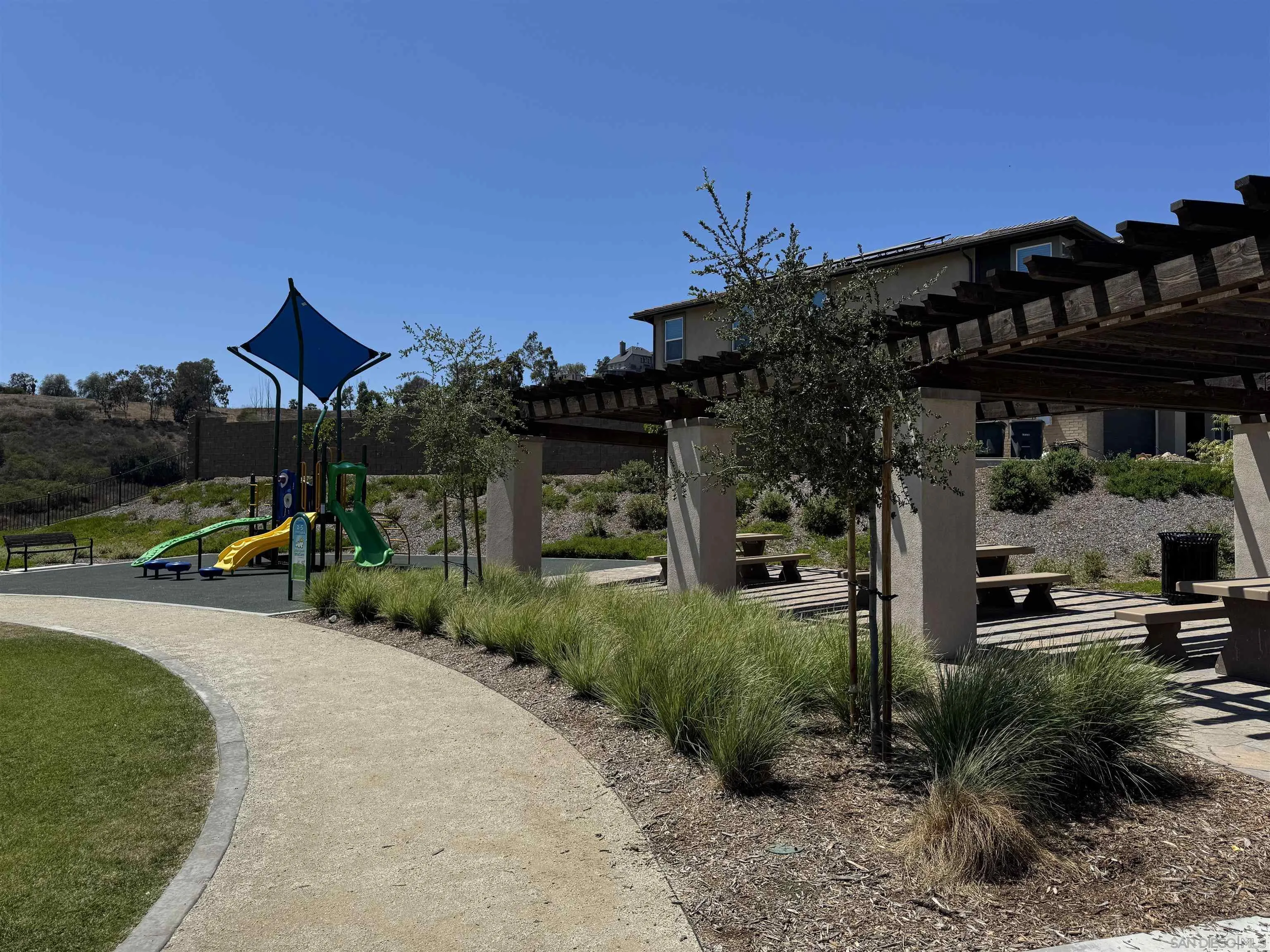 941 Lindbergh Drive San Marcos, CA 92069 - Photo 41 of 44 a view of a house with backyard and porch