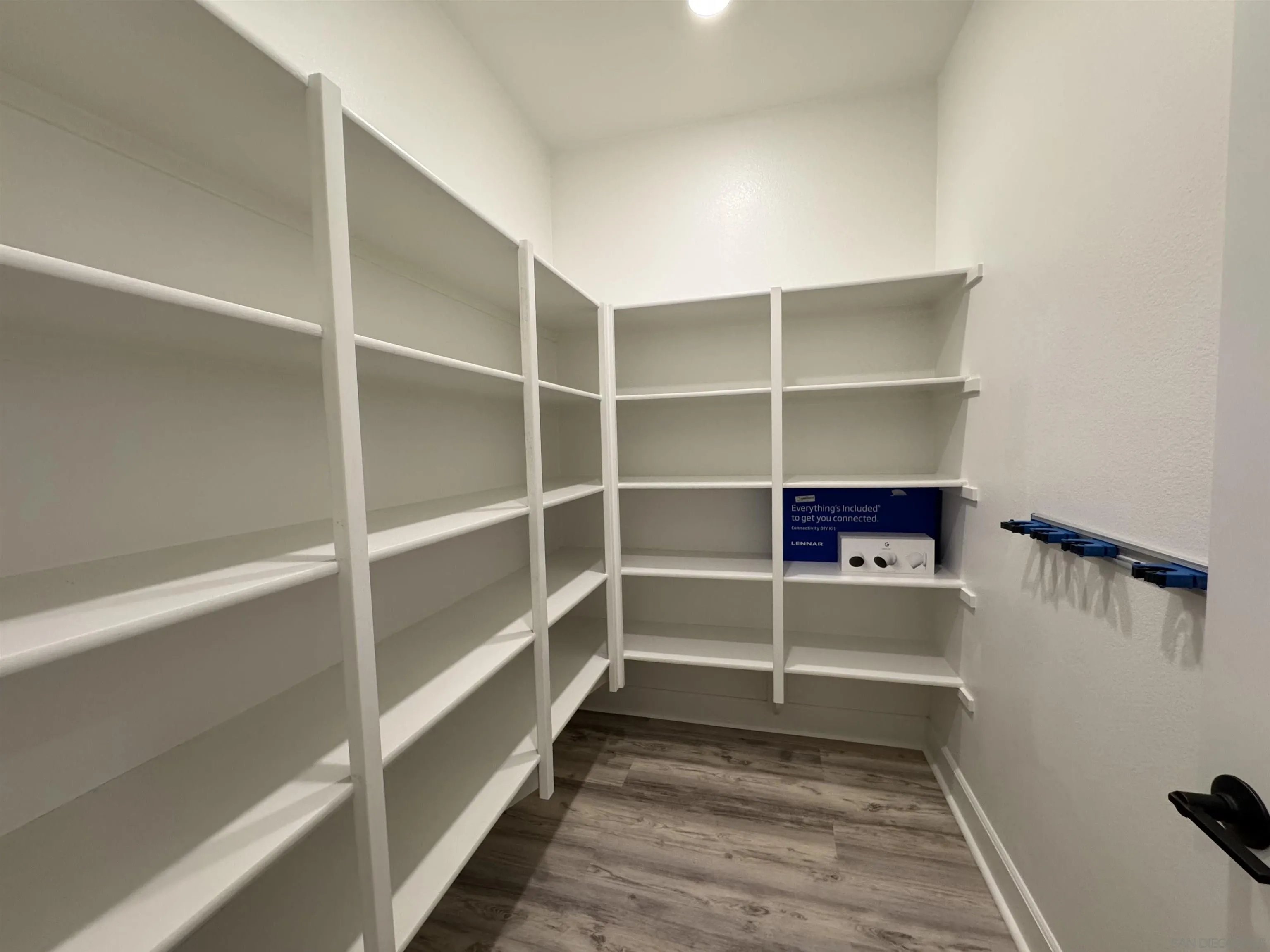941 Lindbergh Drive San Marcos, CA 92069 - Photo 7 of 44 a view of walk in closet with empty racks