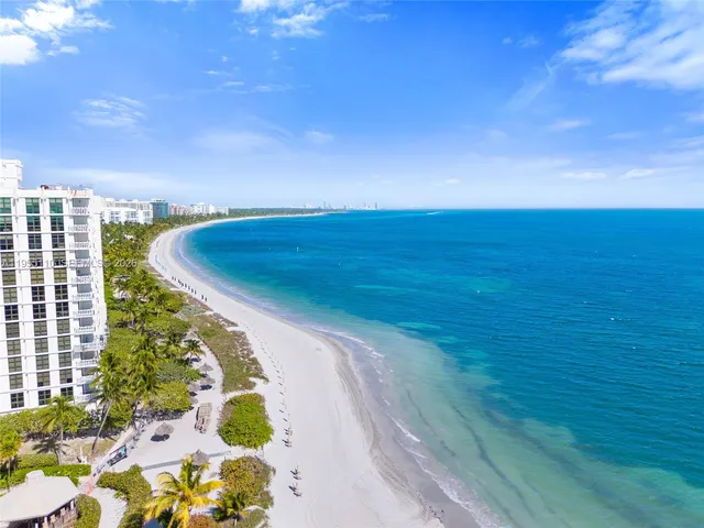 a view of a swimming pool from a balcony
