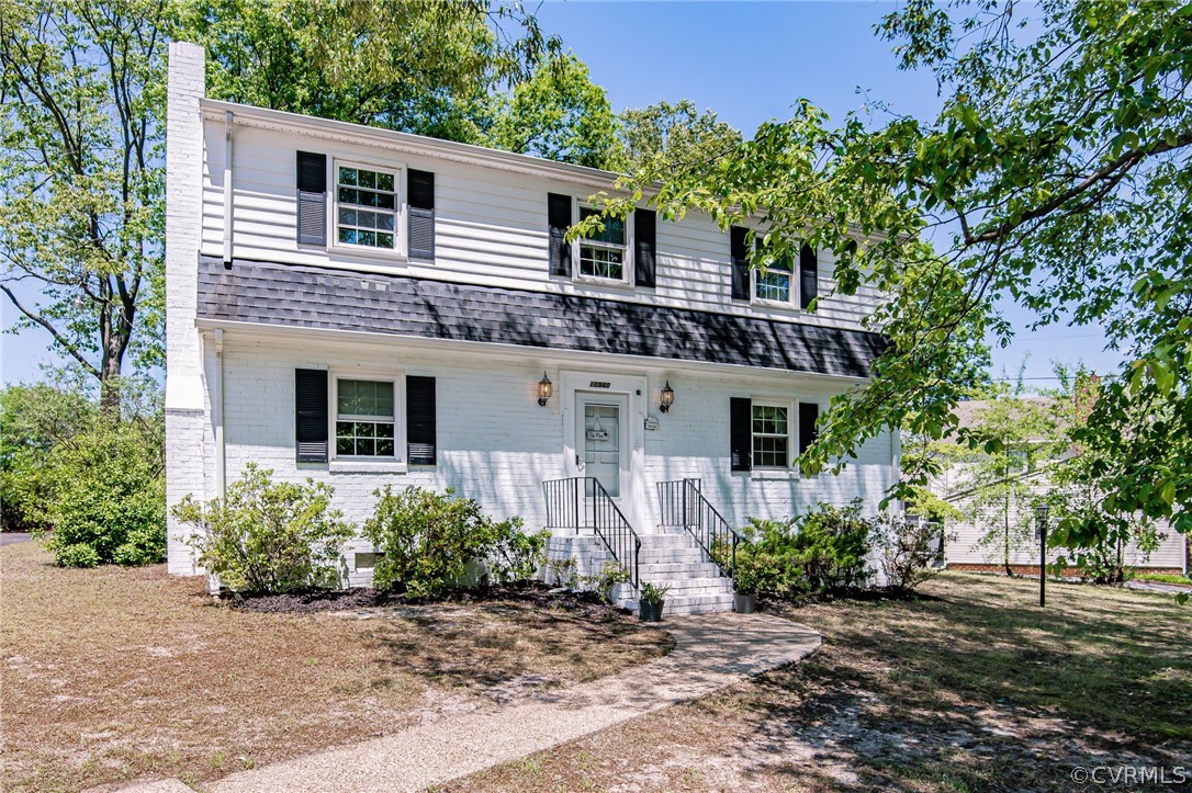 front view of a house with a yard
