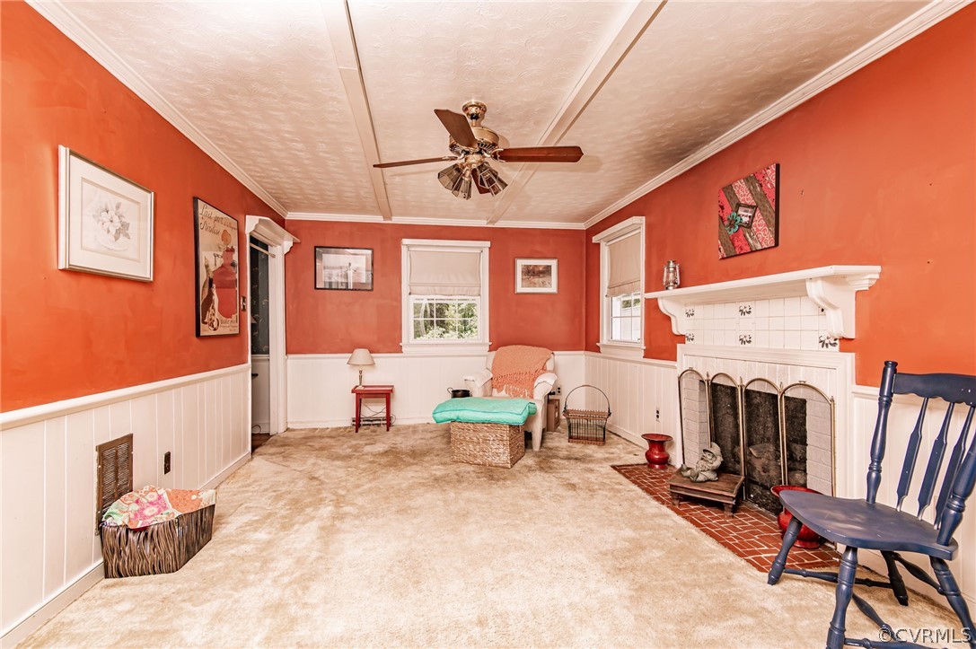 10960 Stepney Road Chester, VA 23831 - Photo 14 of 31 a living room with furniture a fireplace and a flat screen tv