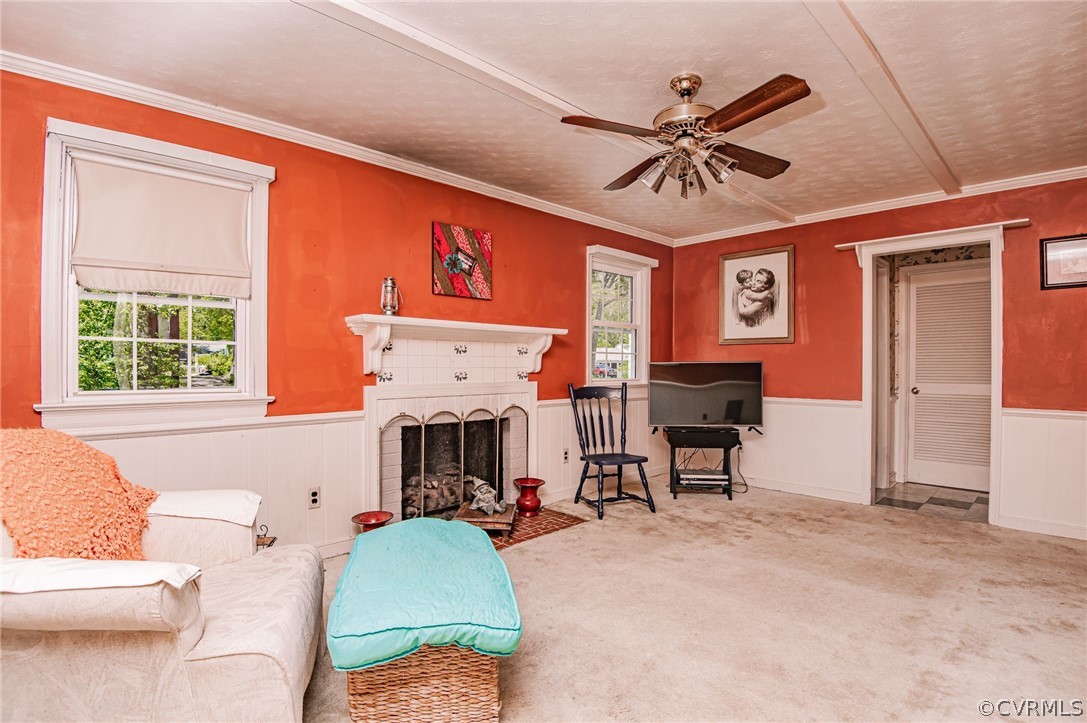 10960 Stepney Road Chester, VA 23831 - Photo 15 of 31 a living room with furniture a fireplace and a window