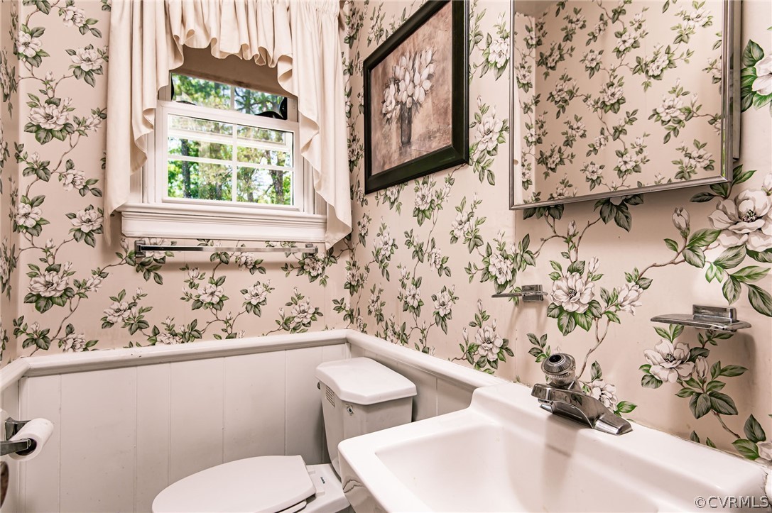 10960 Stepney Road Chester, VA 23831 - Photo 16 of 31 a bathroom with a toilet and a sink