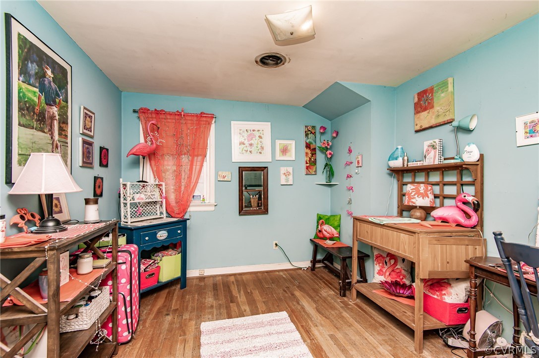 10960 Stepney Road Chester, VA 23831 - Photo 22 of 31 a living room with furniture and a wooden floor