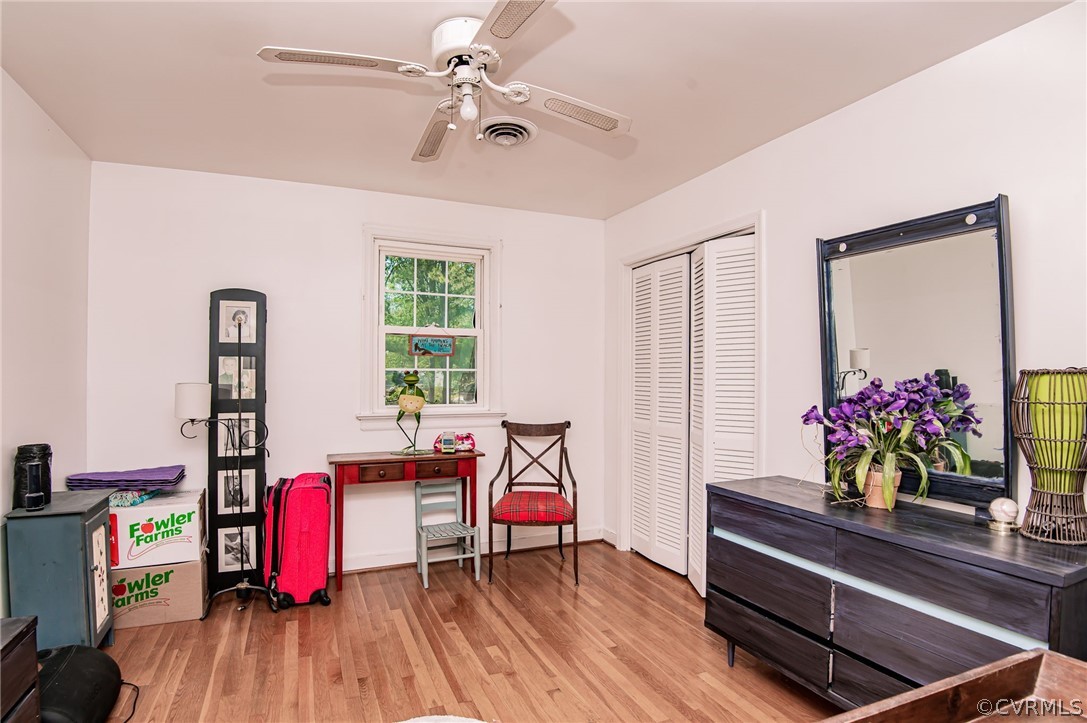 10960 Stepney Road Chester, VA 23831 - Photo 25 of 31 a living room with furniture and wooden floor