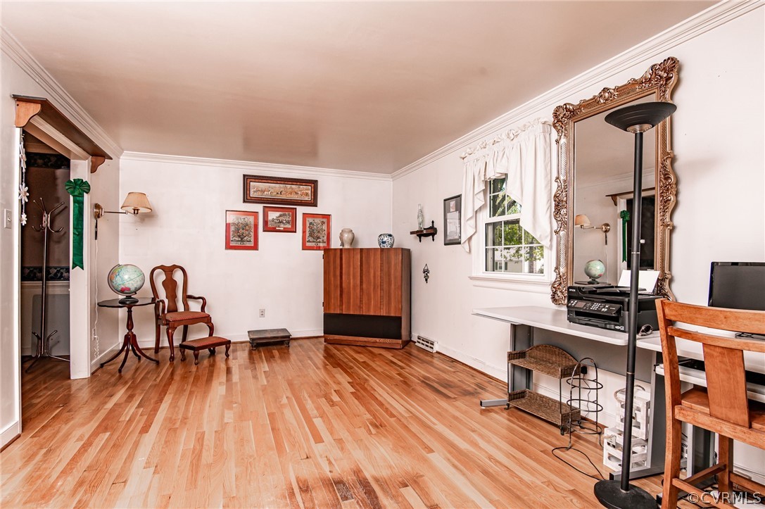 10960 Stepney Road Chester, VA 23831 - Photo 5 of 31 a living room with furniture and a wooden floor
