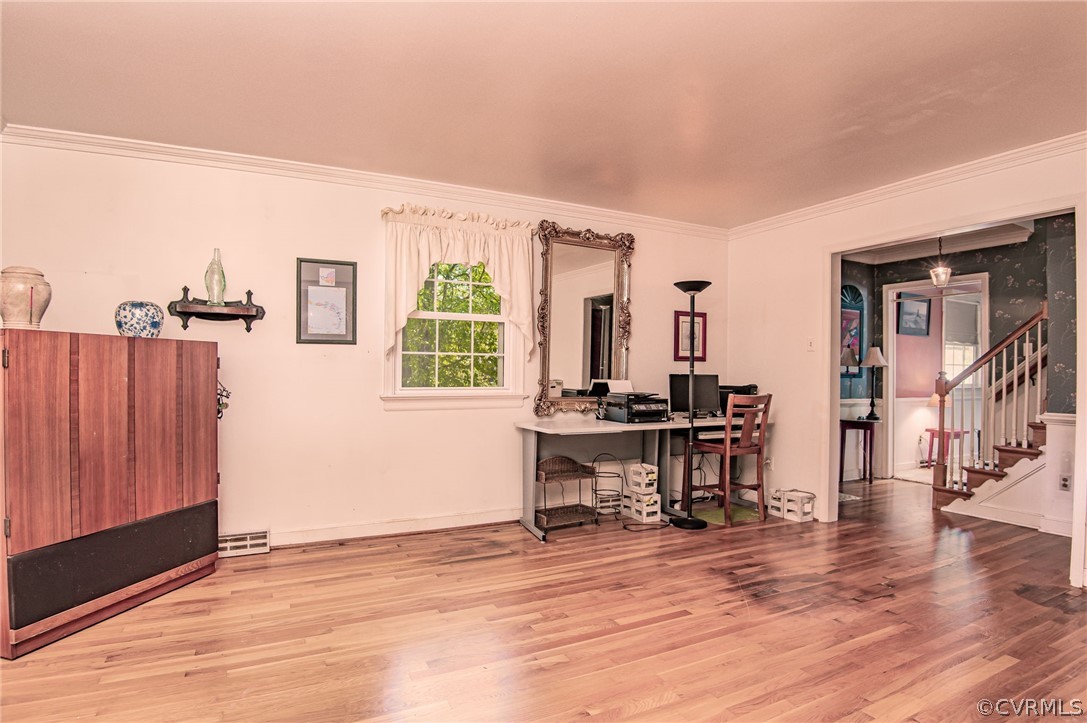 10960 Stepney Road Chester, VA 23831 - Photo 7 of 31 a view of a workspace with furniture and a window