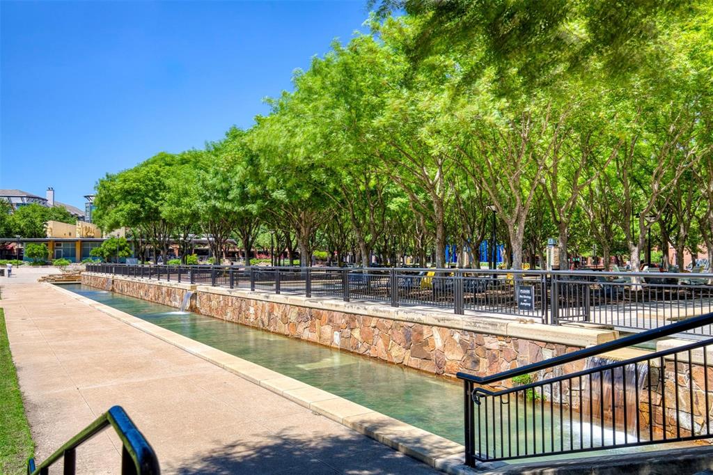 15741 Seabolt Place, Unit 28 Addison, TX 75001 - Photo 28 of 37 Surrounding community featuring a patio and a water view