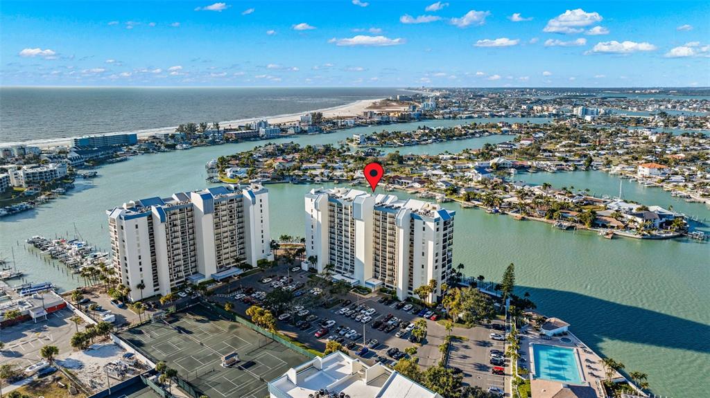 9495 Blind Pass Road, Unit 204 St. Pete Beach, FL 33706 - Photo 26 of 36 a view of a city and ocean view