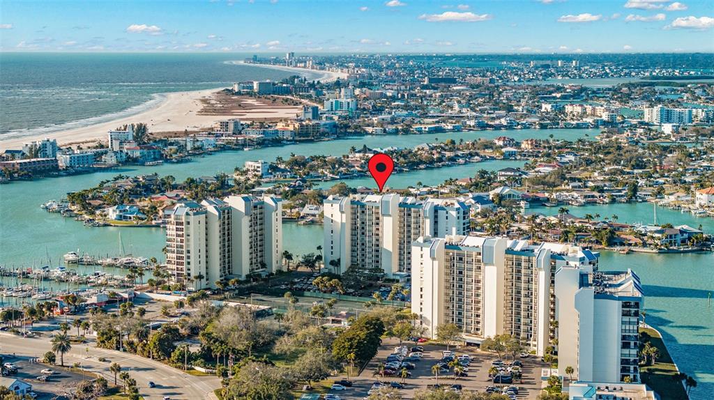 9495 Blind Pass Road, Unit 204 St. Pete Beach, FL 33706 - Photo 28 of 36 a view of a city and lake view