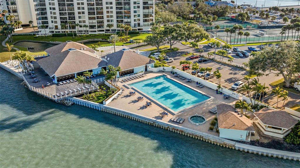 9495 Blind Pass Road, Unit 204 St. Pete Beach, FL 33706 - Photo 30 of 36 an aerial view of a house with a ocean view