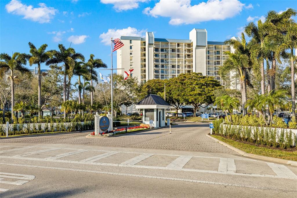 9495 Blind Pass Road, Unit 204 St. Pete Beach, FL 33706 - Photo 35 of 36 a view of a city with tall buildings
