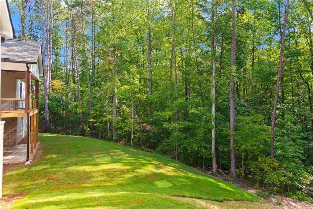 240 Highlands Ball Ground, GA 30107 - Photo 50 of 57 a view of a swimming pool with a large trees