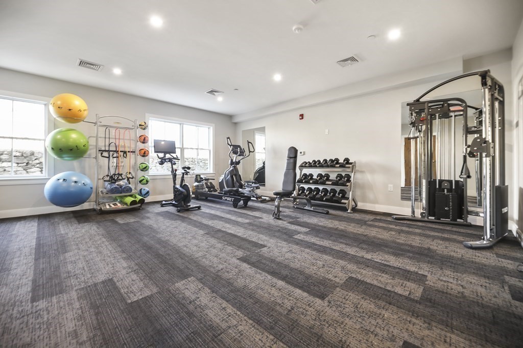 425 Lagrange Street, Unit 109 Boston, MA 02132 - Photo 40 of 42 a room with gym equipment