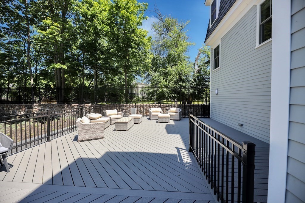 425 Lagrange Street, Unit 109 Boston, MA 02132 - Photo 42 of 42 a view of a patio with wooden floor