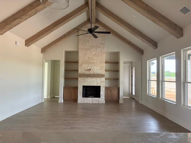 120 Turtle Back Ridge Decatur, TX 76234 - Photo 2 of 9 an empty room with windows and fireplace