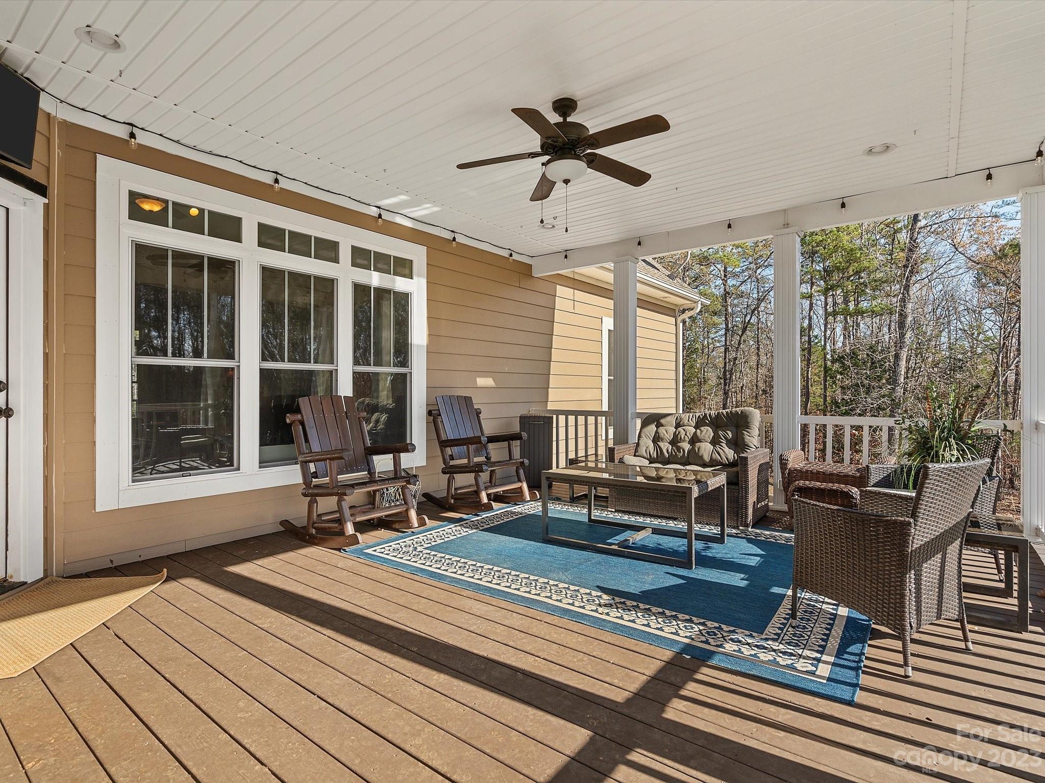 810 Sutton Spring Road York, SC 29745 - Photo 26 of 47 a living room with couch and floor to ceiling windows