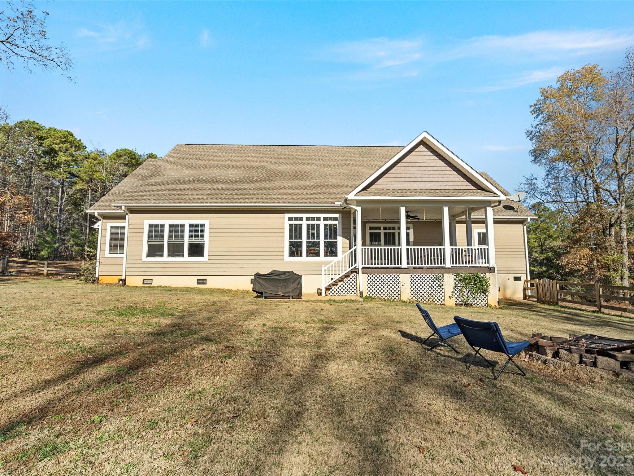 810 Sutton Spring Road York, SC 29745 - Photo 29 of 47 a front view of a house with a yard