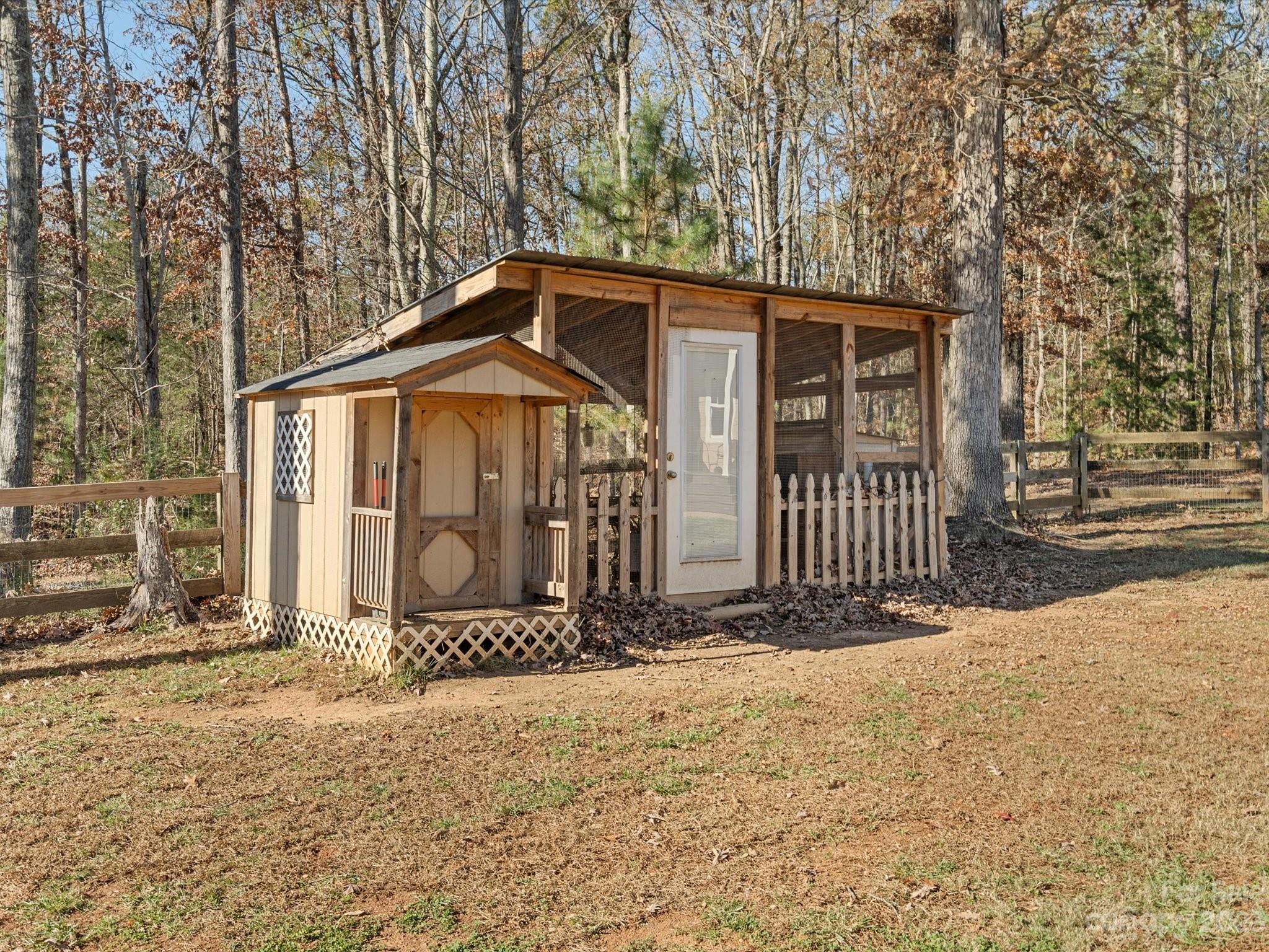 810 Sutton Spring Road York, SC 29745 - Photo 30 of 47 a front view of a house with a yard