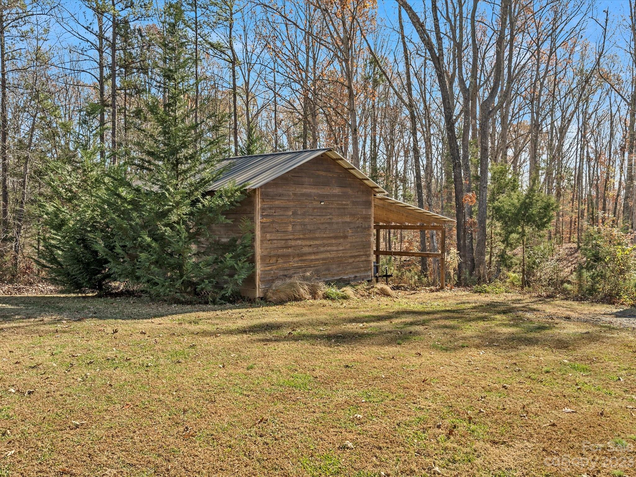 810 Sutton Spring Road York, SC 29745 - Photo 31 of 47 a front view of a house with a yard