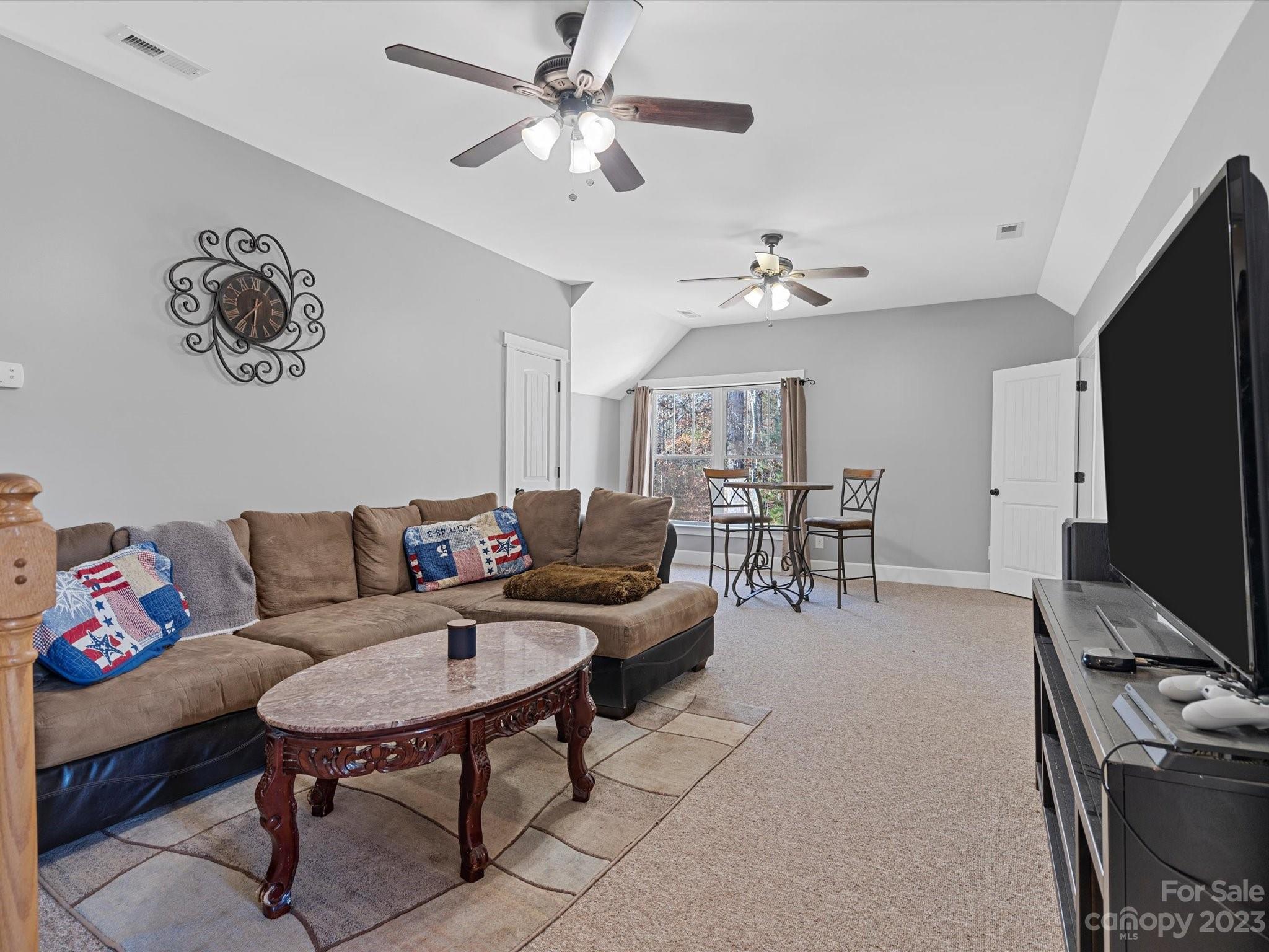 810 Sutton Spring Road York, SC 29745 - Photo 34 of 47 a living room with furniture and a flat screen tv