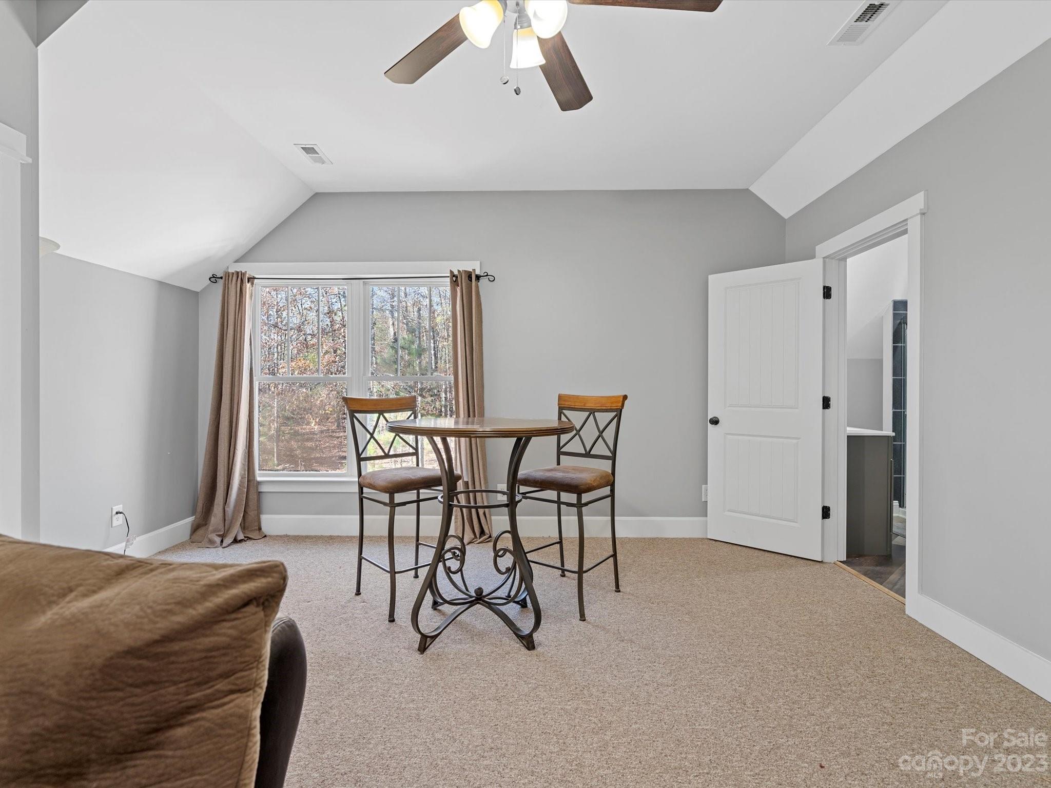 810 Sutton Spring Road York, SC 29745 - Photo 35 of 47 a view of a livingroom with furniture and chandelier