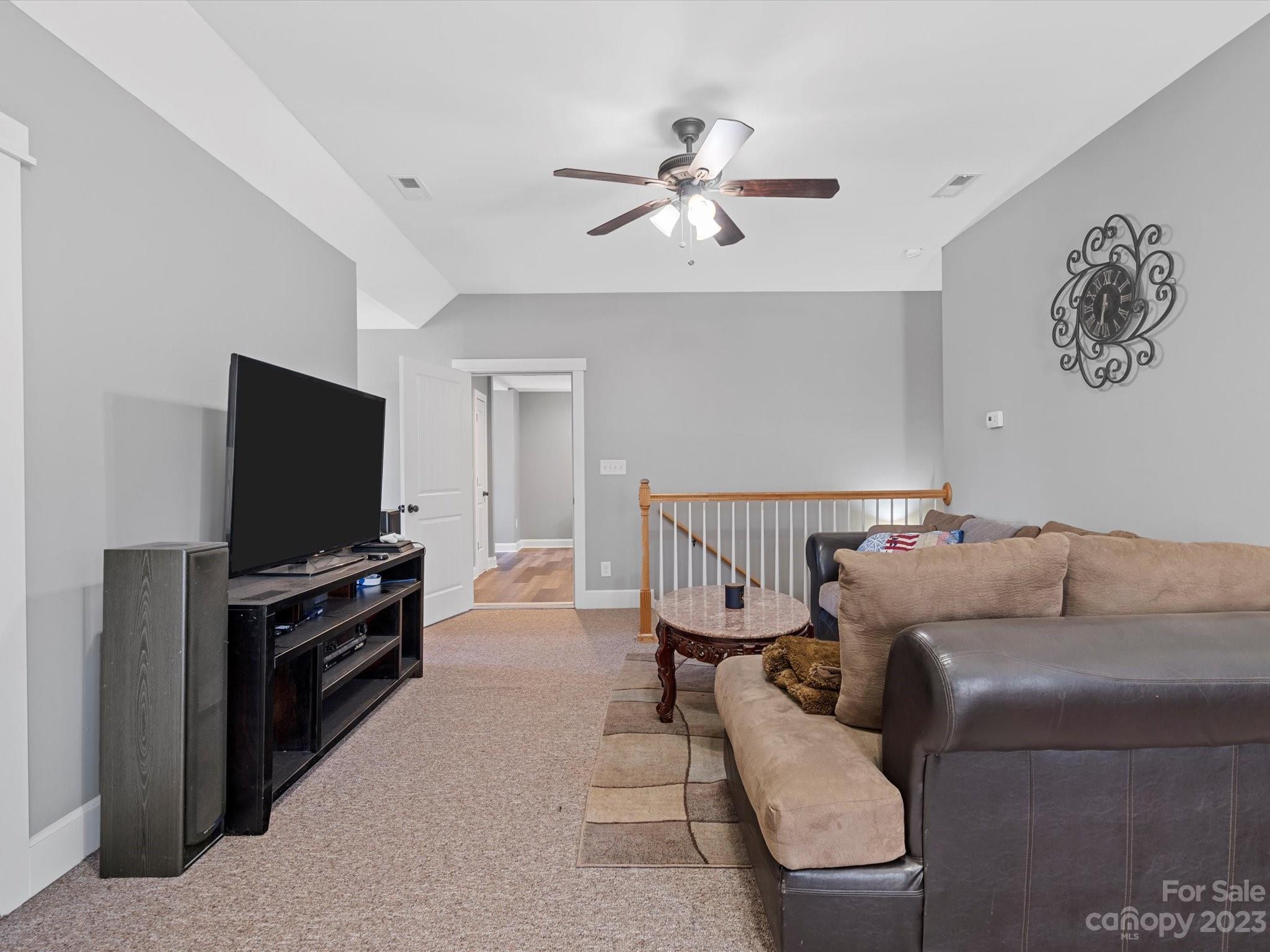 810 Sutton Spring Road York, SC 29745 - Photo 37 of 47 a living room with furniture and a flat screen tv