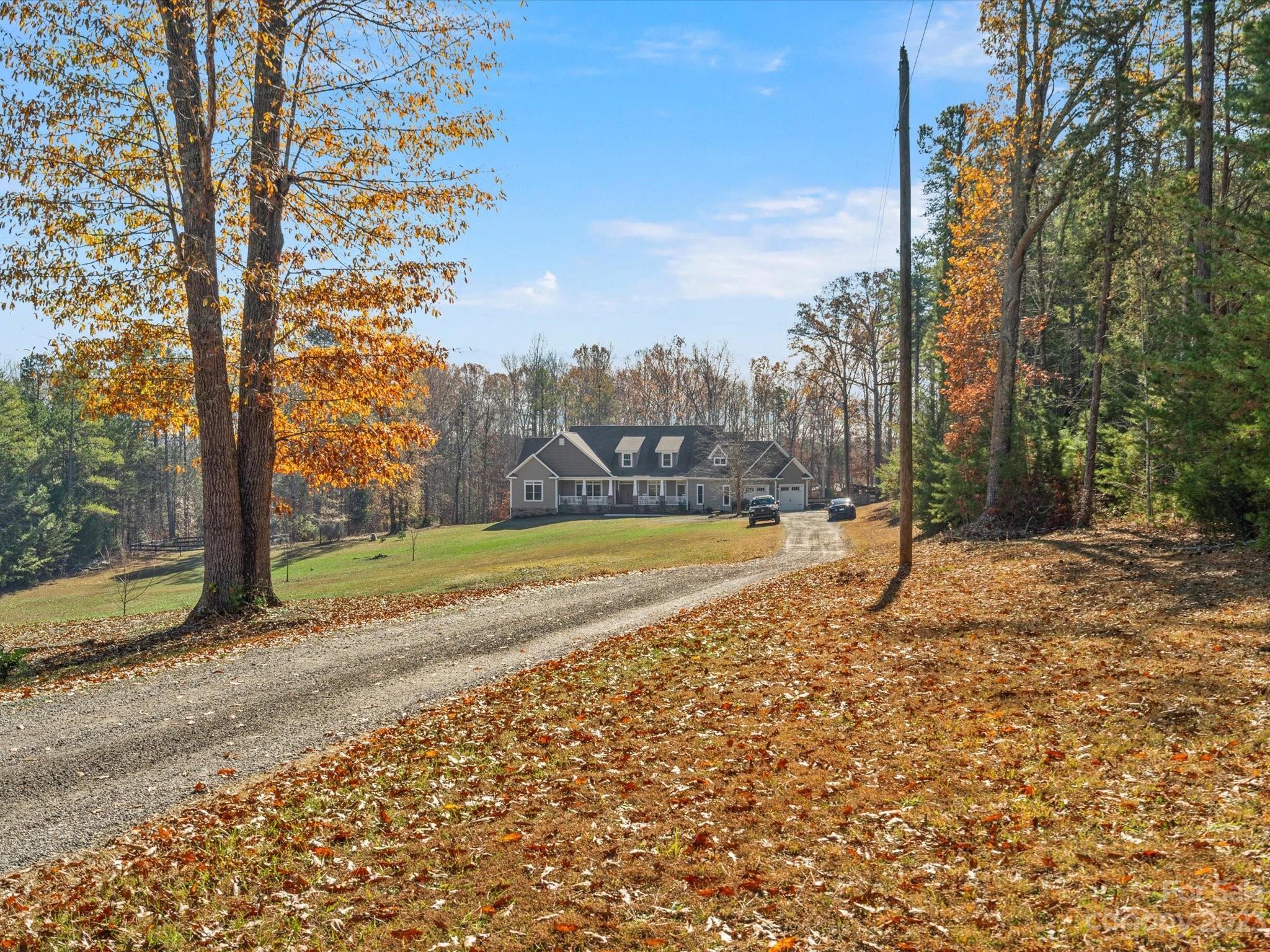 810 Sutton Spring Road York, SC 29745 - Photo 44 of 47 a view of a yard with a house