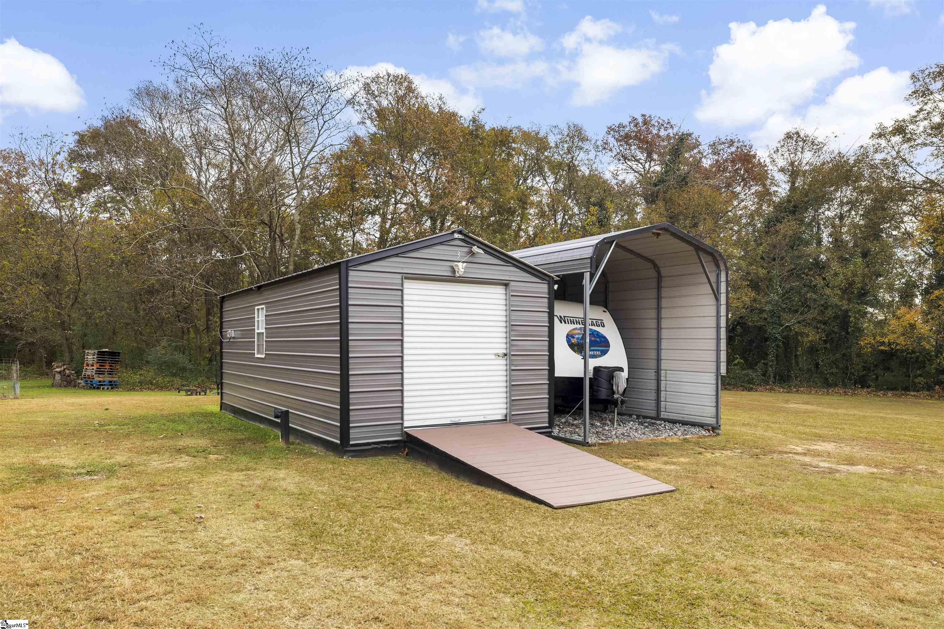 106 Morgan Avenue Iva, SC 29655 - Photo 45 of 50 Shed #3 (Storage) Shed #4 (RV Carport) all sheds have electricity