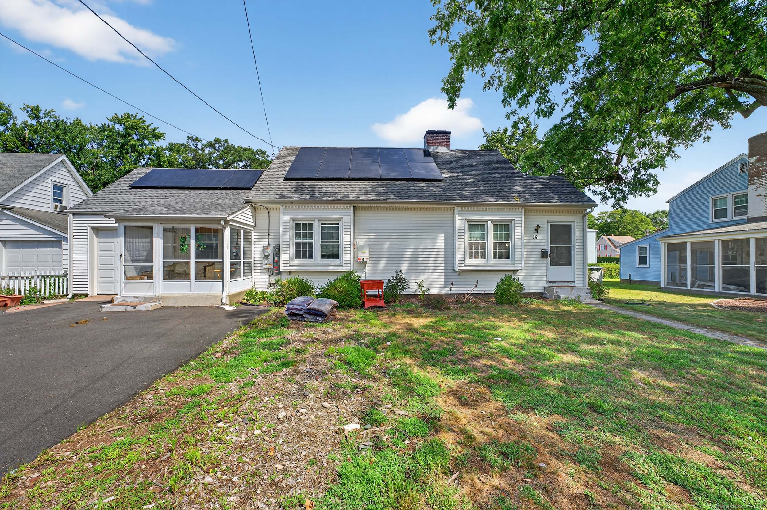 15 St John Street Manchester, CT 06040 - Photo 13 of 36 a view of a house with backyard sitting area and garden