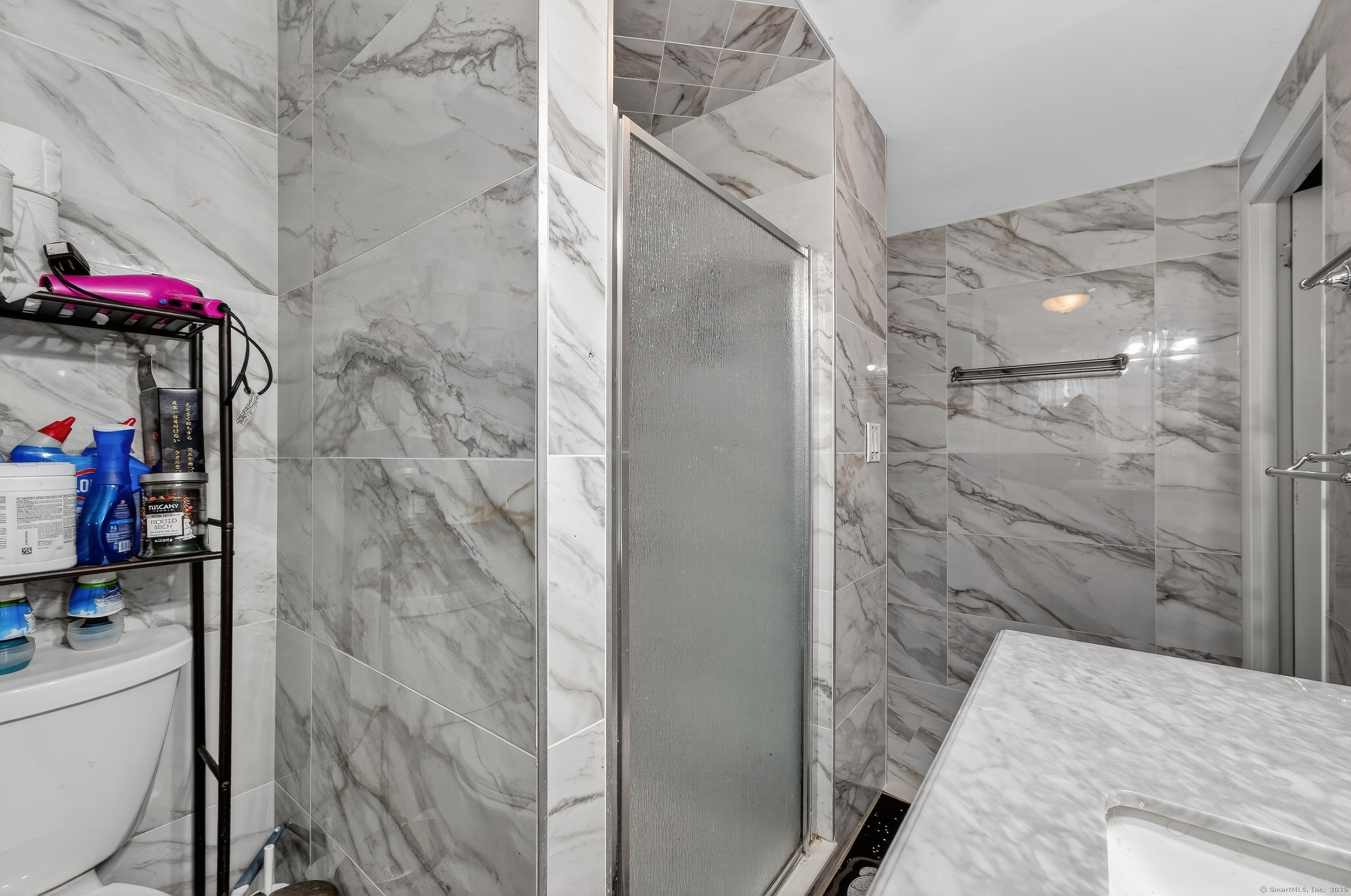 15 St John Street Manchester, CT 06040 - Photo 25 of 36 a bathroom with a shower and a sink