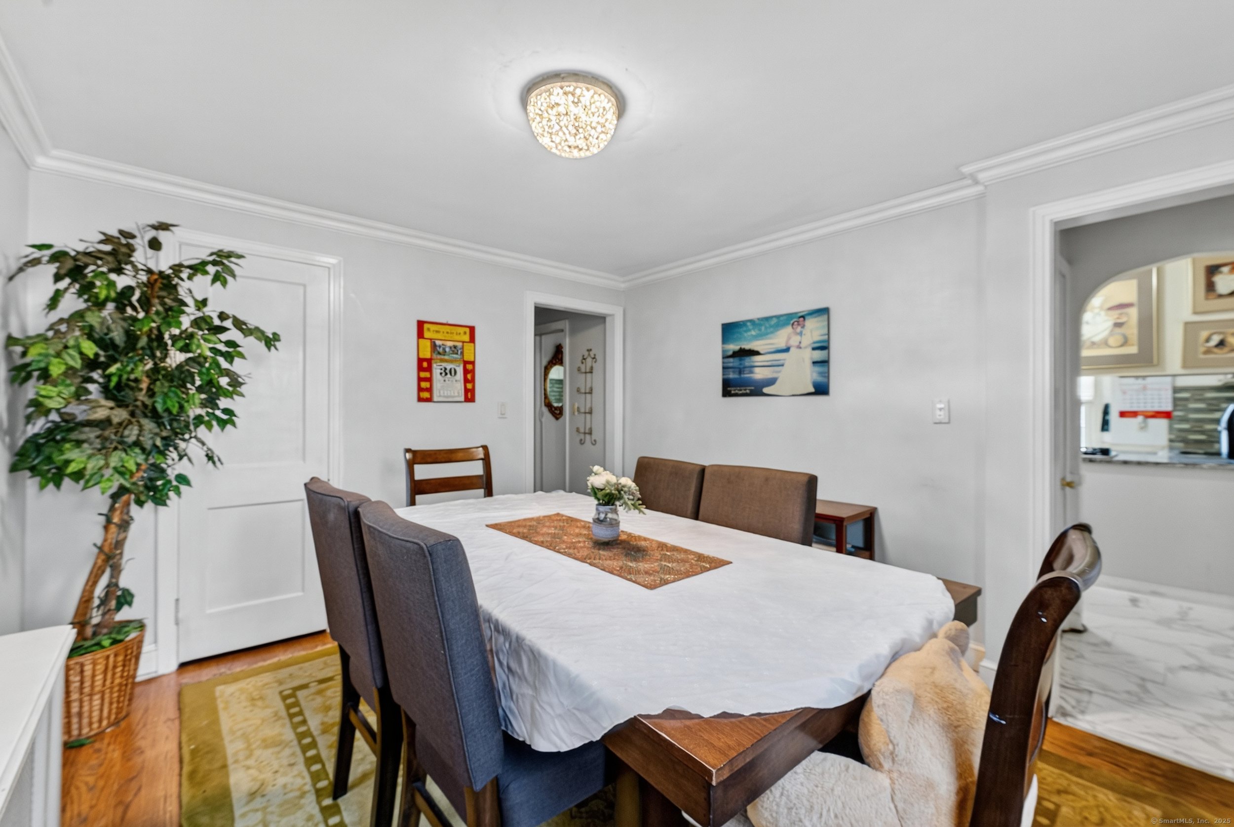 15 St John Street Manchester, CT 06040 - Photo 6 of 36 a view of a dining room with furniture and wooden floor