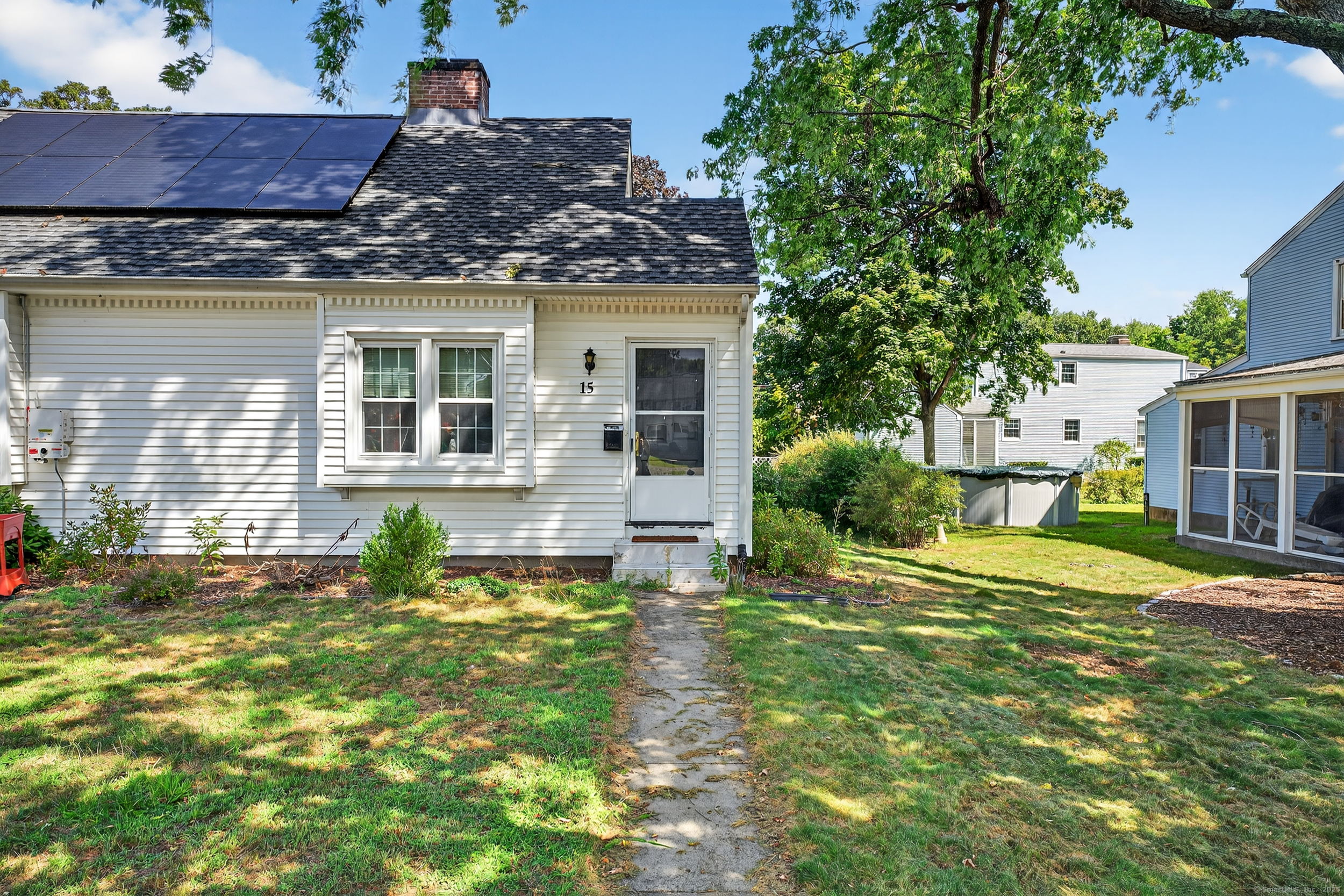 15 St John Street Manchester, CT 06040 - Photo 8 of 36 a house view with a garden space