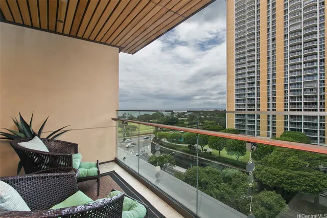 a view of balcony with furniture