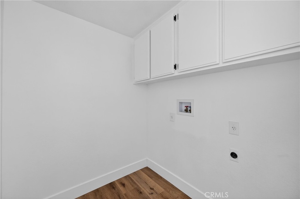 21484 Dickinson Road Moreno Valley, CA 92557 - Photo 24 of 48 a view of small space with racks on the wall