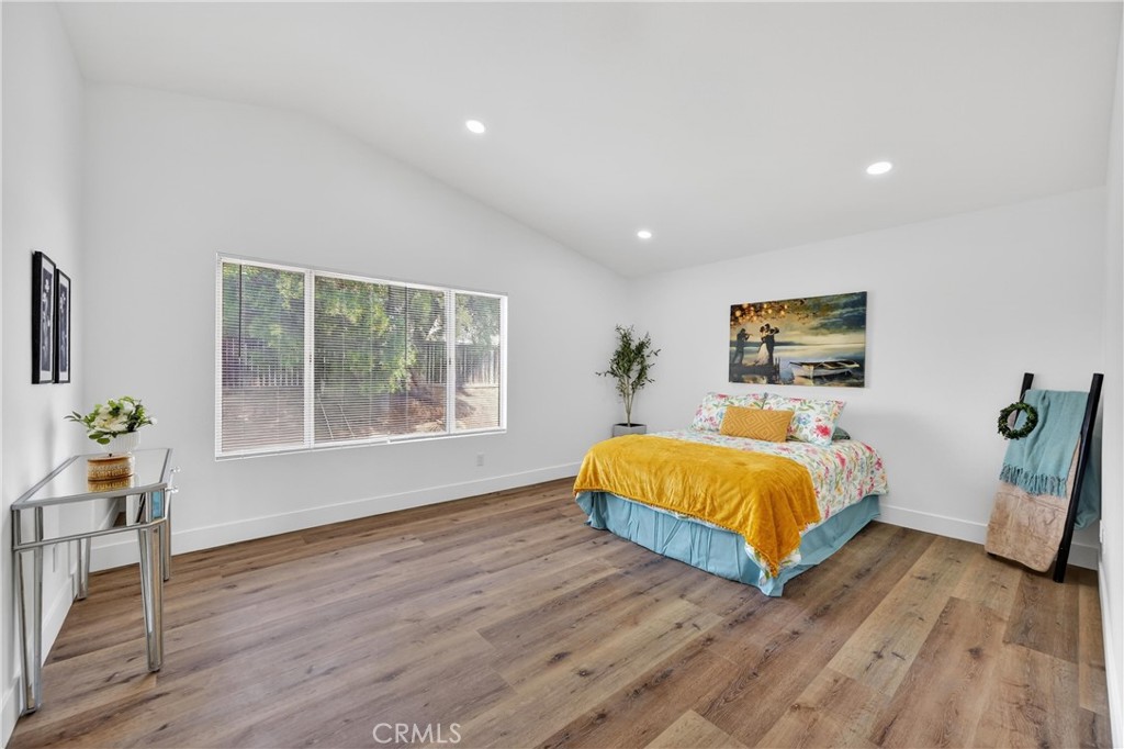 21484 Dickinson Road Moreno Valley, CA 92557 - Photo 25 of 48 a bed room with a bed and a window