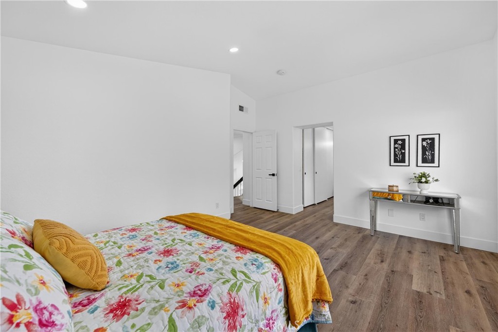 21484 Dickinson Road Moreno Valley, CA 92557 - Photo 27 of 48 a bedroom with a bed and a chair