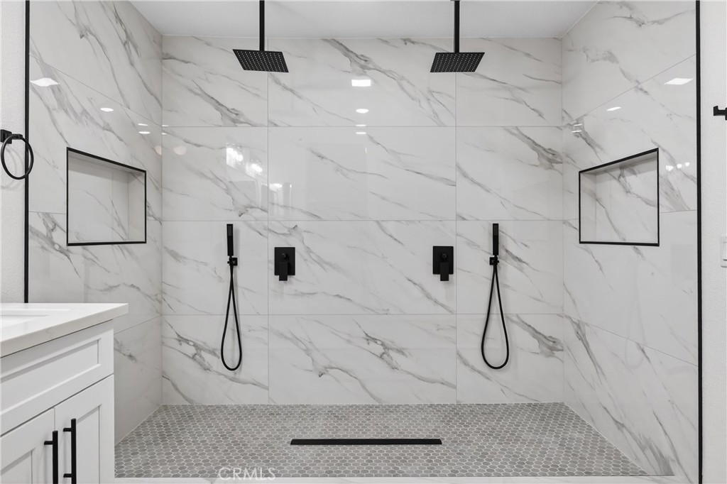 21484 Dickinson Road Moreno Valley, CA 92557 - Photo 32 of 48 a bathroom with a shower