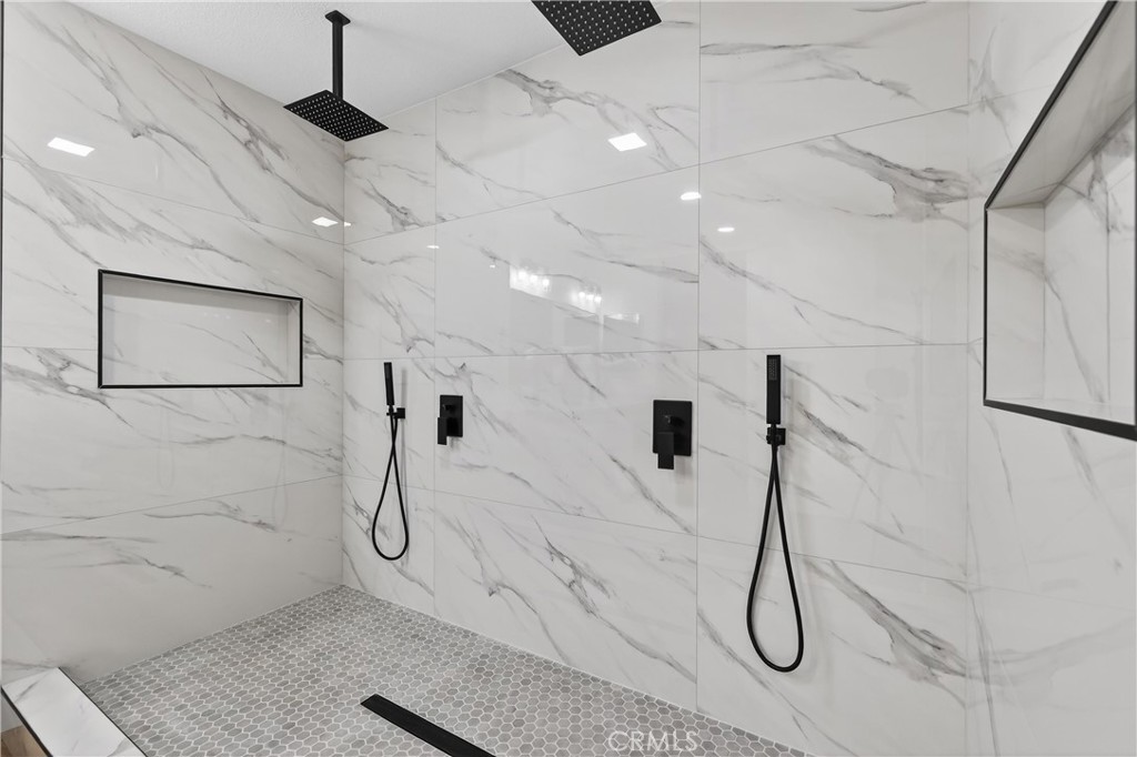 21484 Dickinson Road Moreno Valley, CA 92557 - Photo 33 of 48 a bathroom with a shower