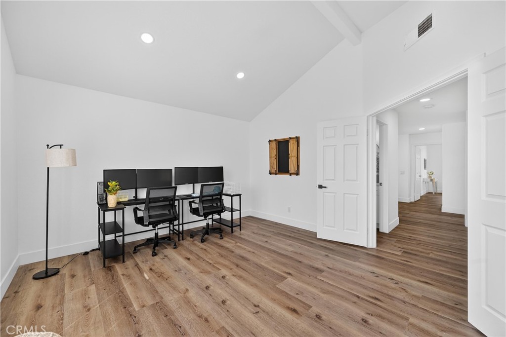 21484 Dickinson Road Moreno Valley, CA 92557 - Photo 44 of 48 a view of a livingroom with workspace and a window