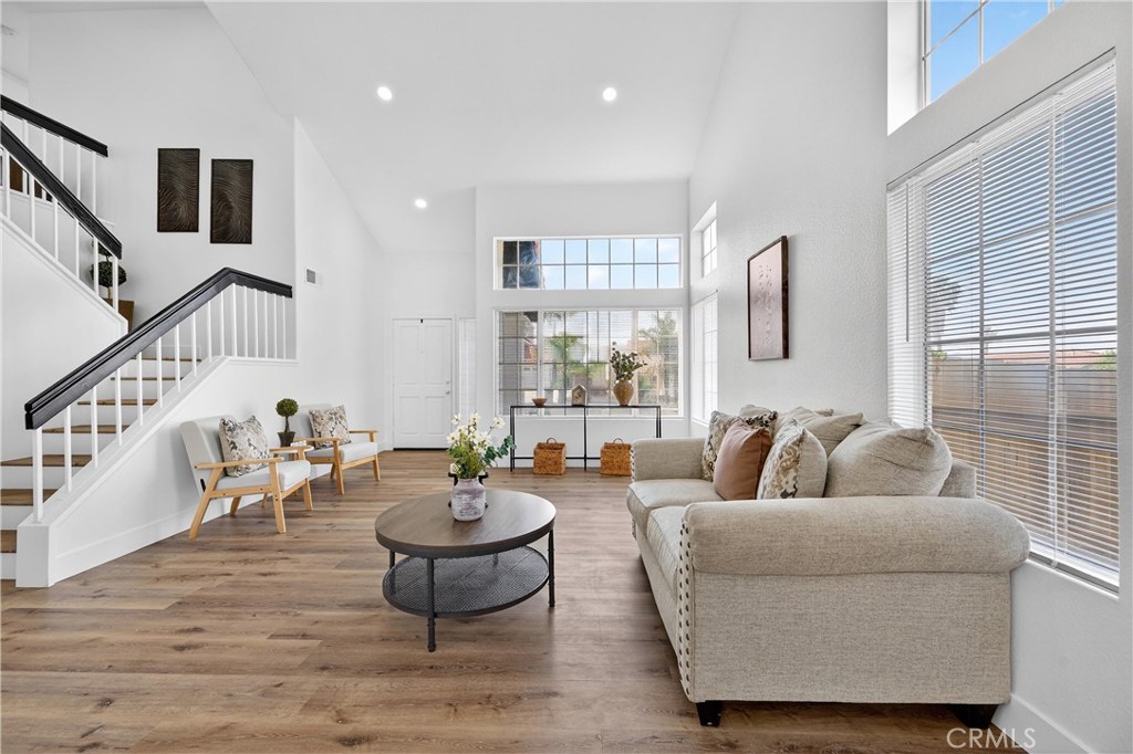 21484 Dickinson Road Moreno Valley, CA 92557 - Photo 8 of 48 a living room with furniture and a large window