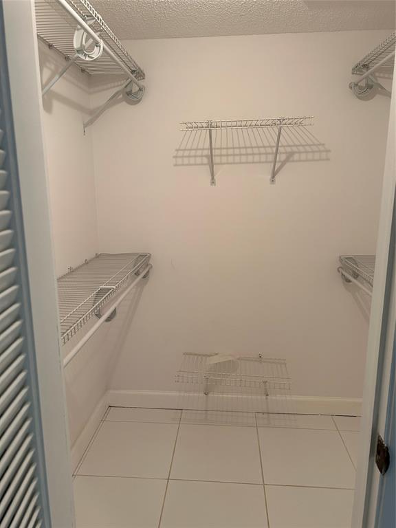 31 Abbey Lane, Unit 207 Delray Beach, FL 33446 - Photo 13 of 15 a view of walk in closet