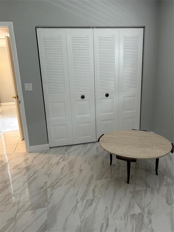 31 Abbey Lane, Unit 207 Delray Beach, FL 33446 - Photo 9 of 15 a view of a bathroom with a sink