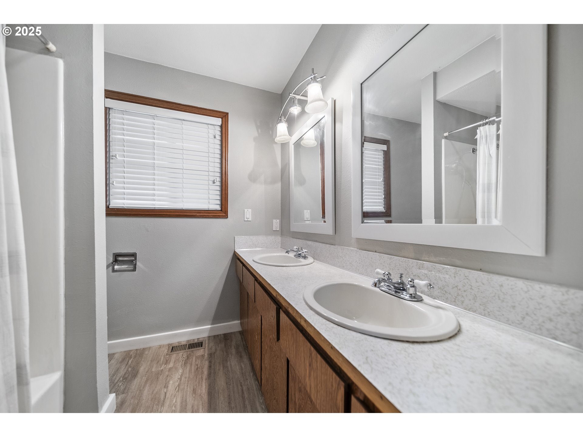 712 Southwest 4th Street Gresham, OR 97080 - Photo 21 of 47 a bathroom with a sink and a mirror