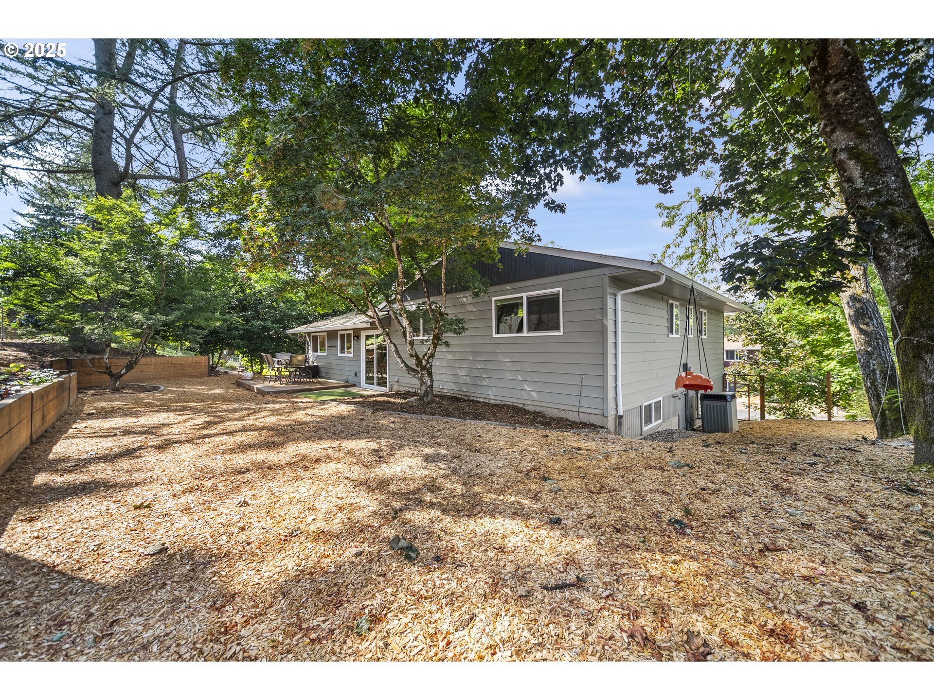 712 Southwest 4th Street Gresham, OR 97080 - Photo 40 of 47 a view of a house with a yard