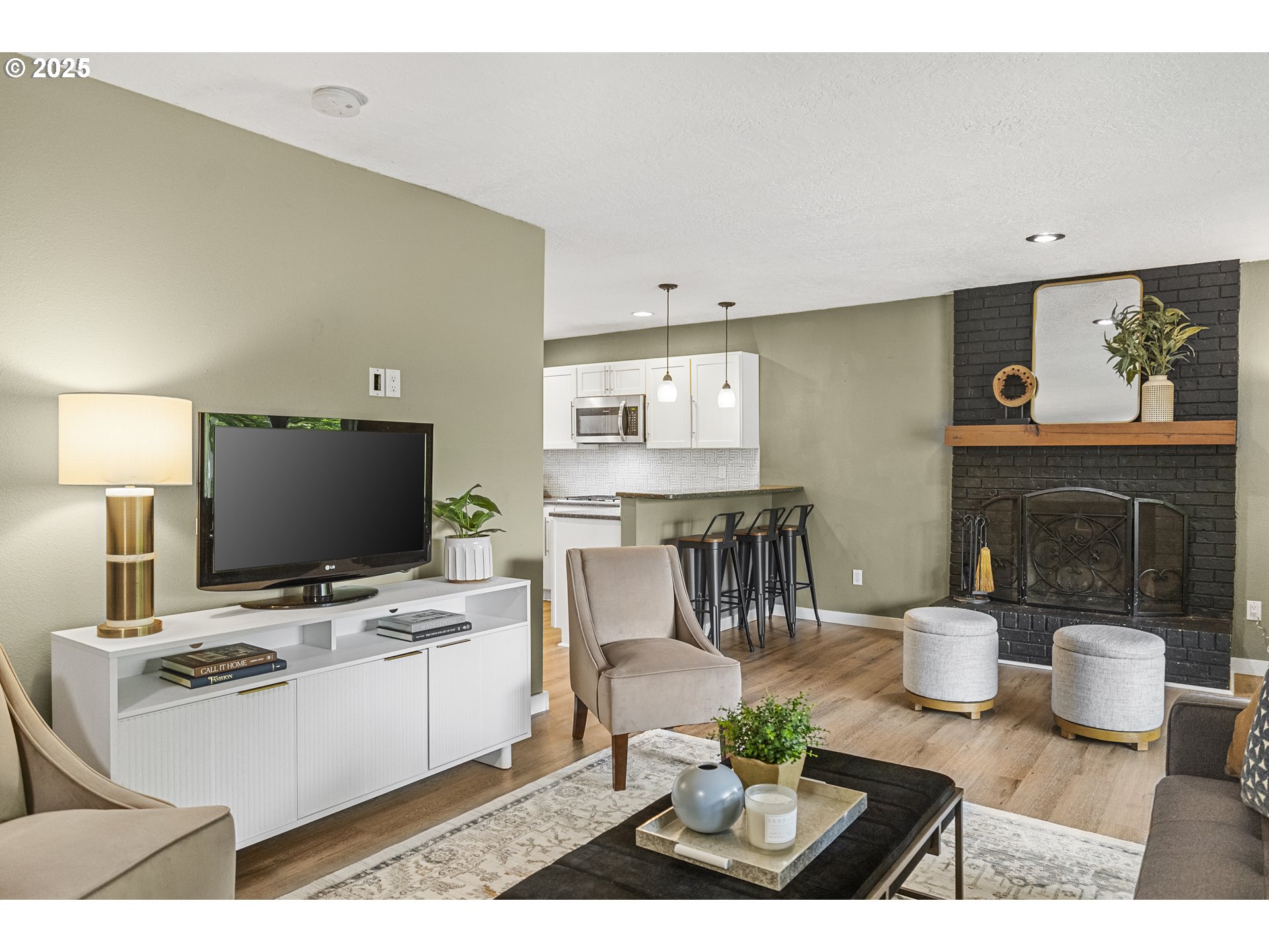 712 Southwest 4th Street Gresham, OR 97080 - Photo 6 of 47 a living room with furniture and a fireplace