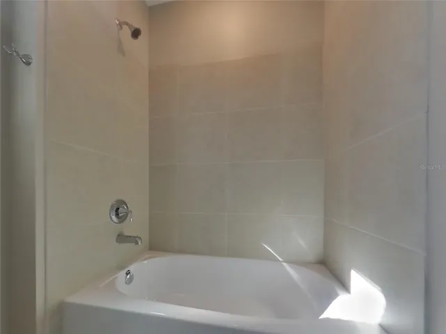 a bathroom with a bathtub