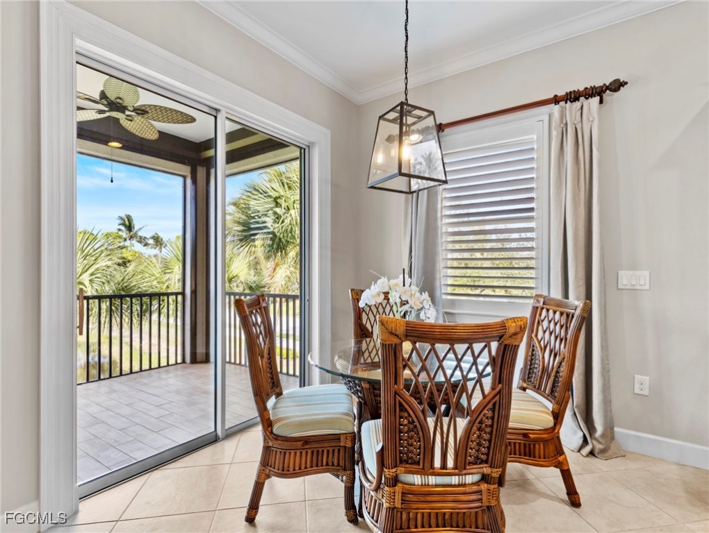12894 New Market Street, Unit 202 Fort Myers, FL 33913 - Photo 13 of 44 a view of a dining room with furniture window and outside view