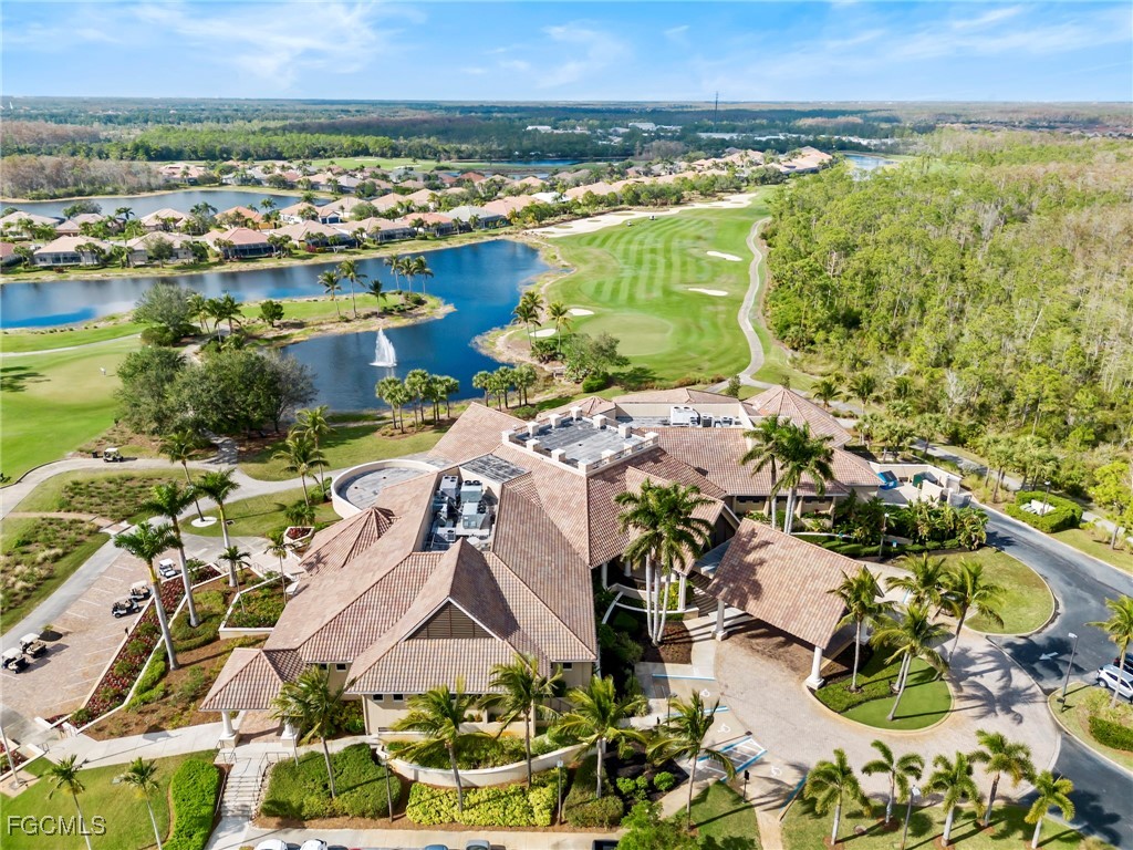 12894 New Market Street, Unit 202 Fort Myers, FL 33913 - Photo 35 of 44 an aerial view of residential houses with outdoor space